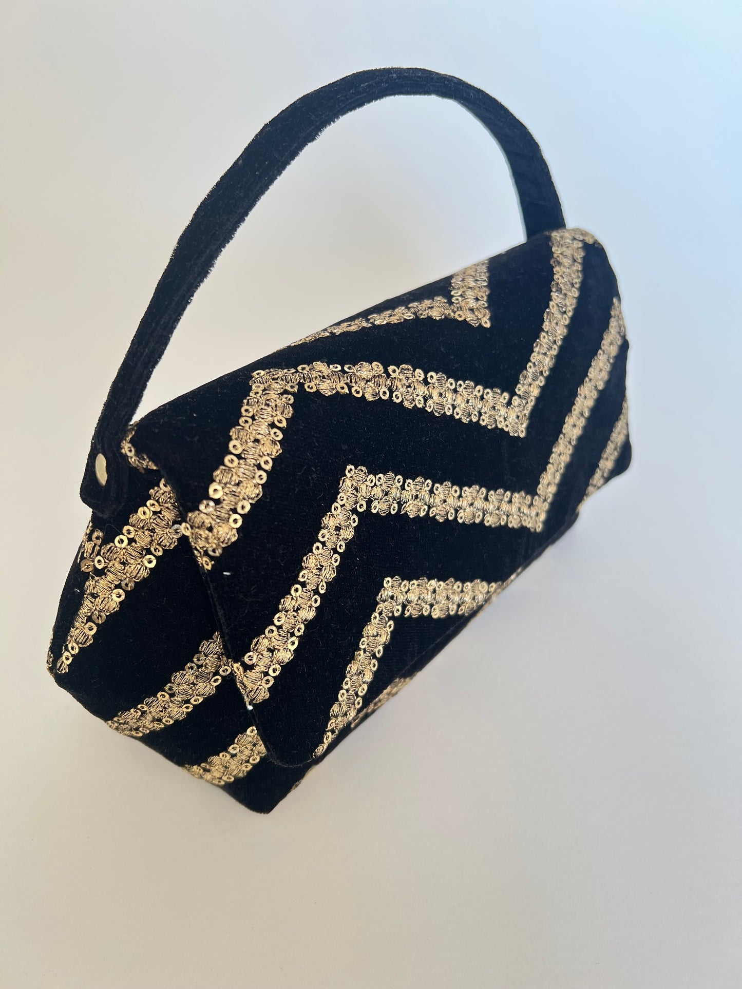 Black and Gold Chand Clutch