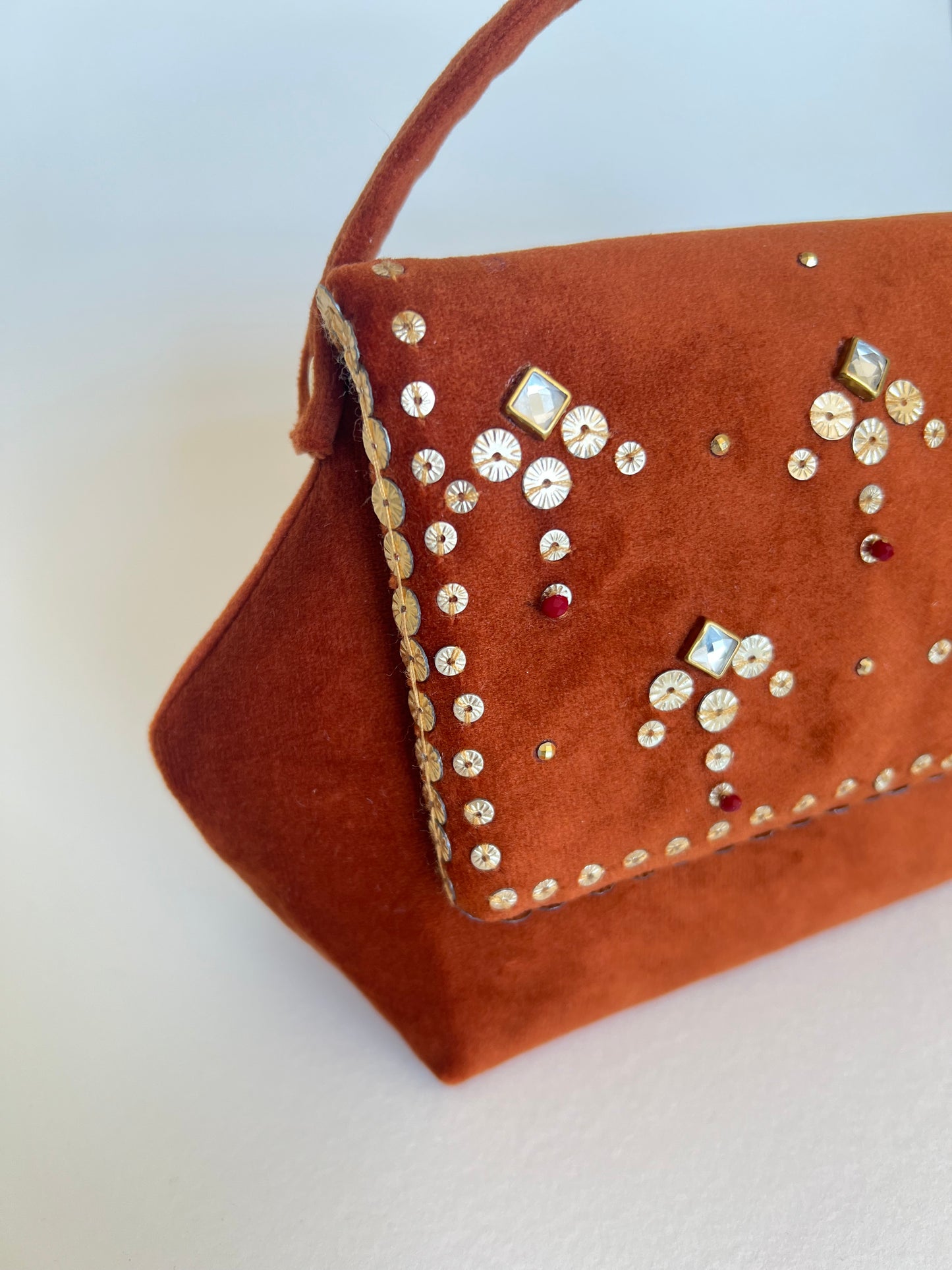 Rust Chand Clutch Bag