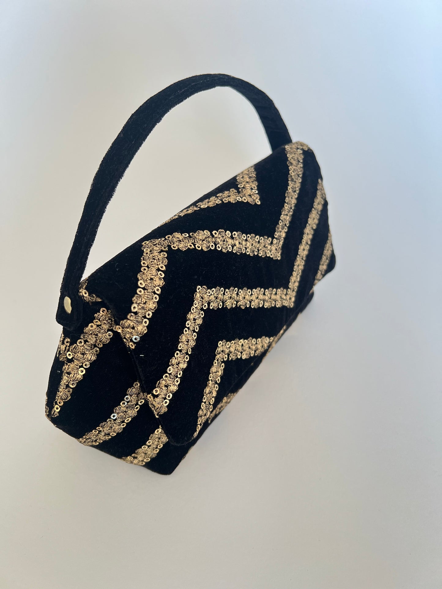 Black and Gold Chand Clutch