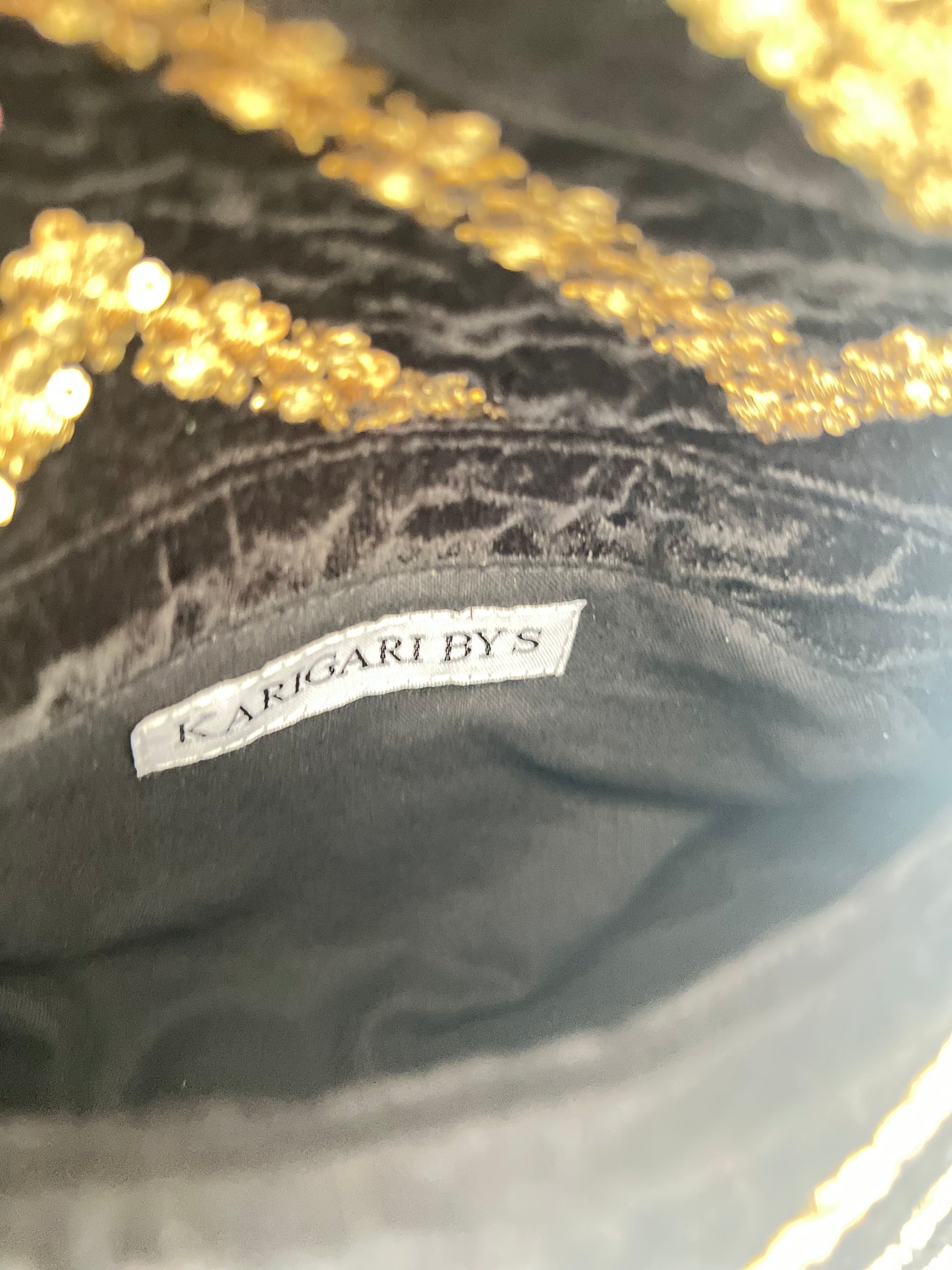 Black and Gold Chand Clutch